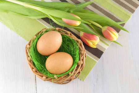 still life with eggs and flowers の写真素材