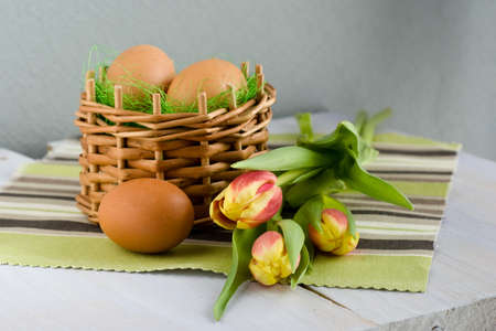 still life with eggs and flowers の写真素材