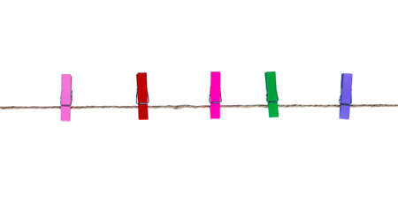 Colorful wooden clothespin hanging on rope. isolated on white background with clipping path.の写真素材