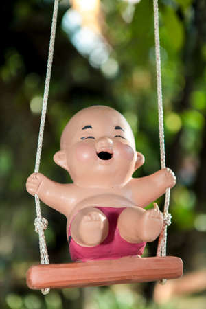 Clay dolls popular ornamental garden.の写真素材