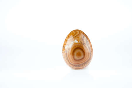 multicolored Agate stones egg shape on white background