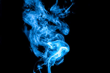 Blue smoke on black backgroundの写真素材