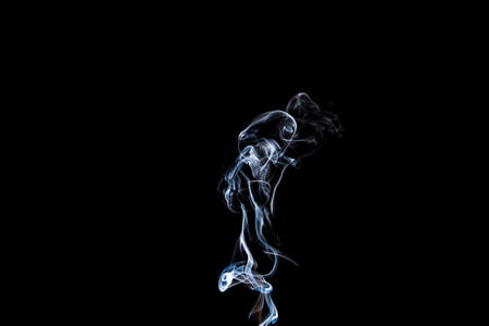 Gray smoke with light on back backgroundの写真素材