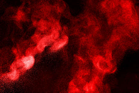 Abstract design of powder cloud against dark background
