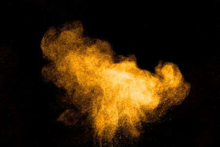 Abstract design of powder cloud against dark backgroundの写真素材