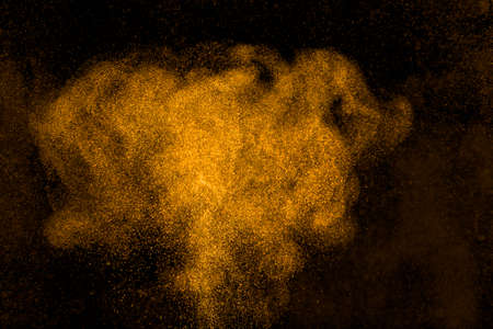 Abstract design of powder cloud against dark backgroundの写真素材