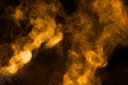 Abstract design of powder cloud against dark backgroundの写真素材