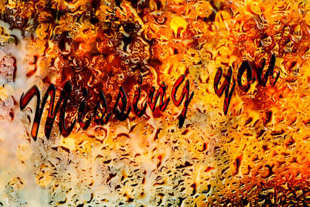 water drop and word on the windowの写真素材