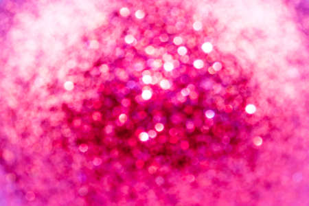An abstract pink glitter and bokeh backgroundの写真素材