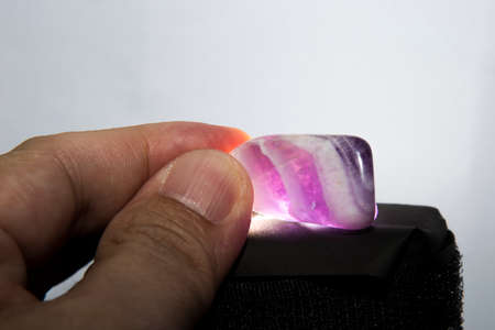 Amethyst on the light. Makes cracks and defects