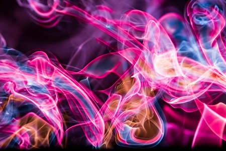 Abstract Colourful Smoke on a black background.