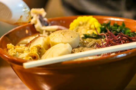 Japanese food under the yellow light in a Japanese restaurant.の写真素材