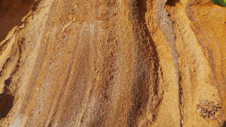 Background of ocean washed rocky geological rocks. Natural background