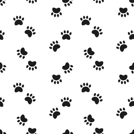 Seamless pattern of cat footprints. Black and white simple design. Print, background, wallpaper, vectorのイラスト素材