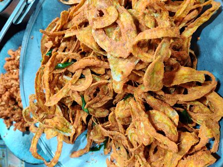 Fried Snake gourd. Crispy chips. Chunchy,tastyの写真素材