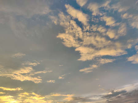 White clouds and blue sky during sunset time.Nature. Daylight.