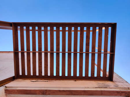 Brown color metal ladder with many number of lines. Cloud backgroundの写真素材