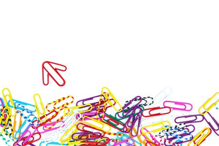 Think different concept for group of stacked paperclip with another one Red paper clip is point to another direction as a team leadership, Business and financeの写真素材