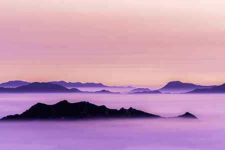 Background with purple foggy on sunsetの写真素材