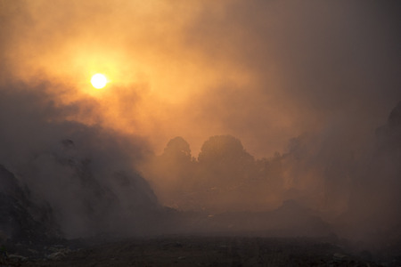 Smoke of burning trash , copy space