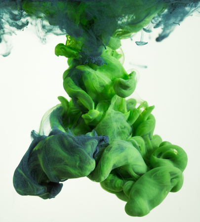 colorful ink drops in waterの写真素材