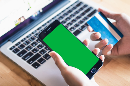 holding Mock-up Green with credit cardの写真素材