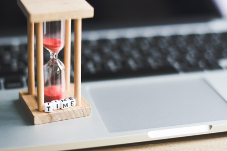 sand clock timer on laptop with