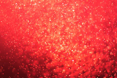 abstract ruby red background with soft blur bokeh light effect