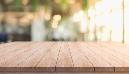 3D Rendering, Wooden top table with bokeh light effect and blur restaurant on background, blur...