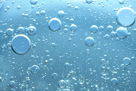 Water bubble texture on blue backgroundの写真素材