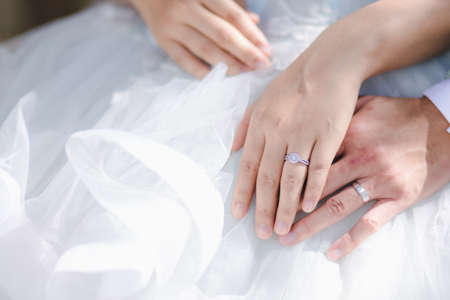 Diamond ring on the finger of an asian womanの写真素材
