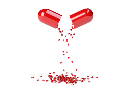Red pills capsule with small red hearts inside pouring out on white background. Pharmacy and dietary supplements along with vitamin pills health of body.   3D Illustration.の写真素材