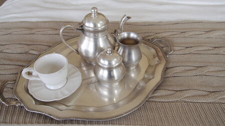 A tea set on the bedの写真素材