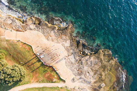 People training dancing on seaside in Croatia aerial drone photoの写真素材