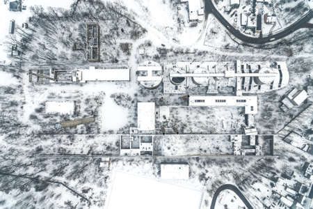Old abandoned cement factory winter snow time in Bedzin Poland aerial drone photoの写真素材