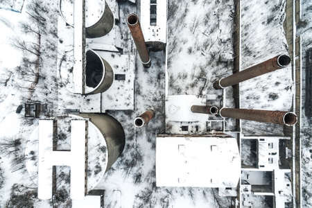 Old abandoned cement factory winter snow time in Bedzin Poland aerial drone photoの写真素材