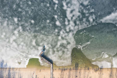 Frozen lake in sunny day, Winter in Dabrowa Gornicza, Pogoria Lake, Silesia, Polandの写真素材