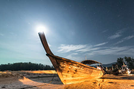 Thai boats on Andaman Sea at night in Krabi Thailand Asiaの写真素材