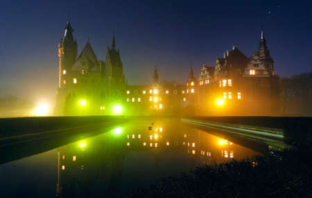 Moszna / Poland - 2020 Night photo Moszna Castle located in Opolskie Voivodeship, Poland