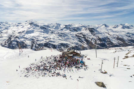Apres ski in Les Menuires resort in winter. French alps in winter, snowy mountains in France Europe