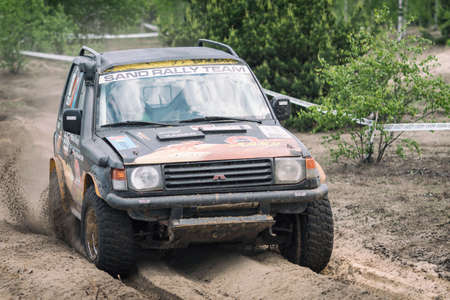 BUKOWNO / POLAND - 4 June 2016: Offroad 4x4 sand rally, quad bike, motocross, atv, off road cars in...