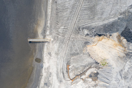 Industrial coal mine, abstract sendimentation tank of mine in Poland. Industrial lake Aerial drone...