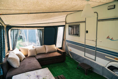 Vacation in camper, caravan. Interrior rooms of Camper caravan car. Holiday on camping in Polandの写真素材