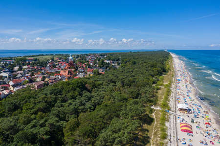Sunbathing on the beach by the sea. Aerial drone photo view of Baltic Sea coast in Hel peninsula, Jastarnia. Puck Bay in Polandのeditorial素材