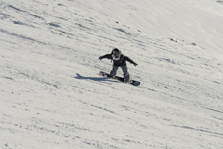 Freeride powder, snowboarding in Les deux alpes resort in winter, mountains in French alps, Rhone Alpes in France Europe. Fresh powder freeride.の写真素材