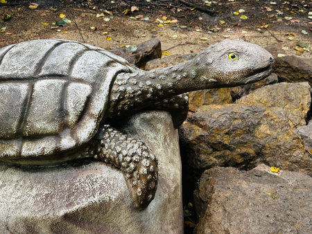 Turtle dinosaur. Realistic figure of an Turtle dinosaur inforest park in Kazimierz Sosnowiec. Prehistoric predator create a fascinating element of the landscape, attracting dinosaur lovers.の写真素材