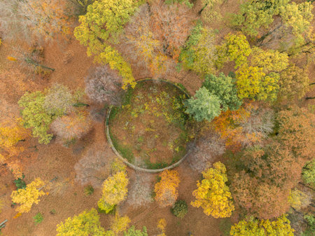 Aerial drone view of a historic neo-Gothic palace located in the city of Kamieniec Zabkowicki in the Lower Silesian Voivodeship.の写真素材