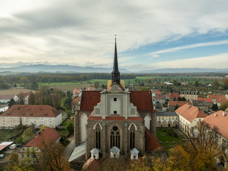 Roman Catholic parish church in Kamieniec Zabkowicki. Aerial drone shot of the church of the Parish of the Assumption of the Blessed Virgin Mary and St. James the Elder in Kamieniec Zabkowicki.の写真素材