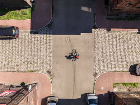 Aerial Drone Footage of a Residential Street in a European Town. Breathtaking View of Red Brick Architecture and Unique Settlement.の写真素材