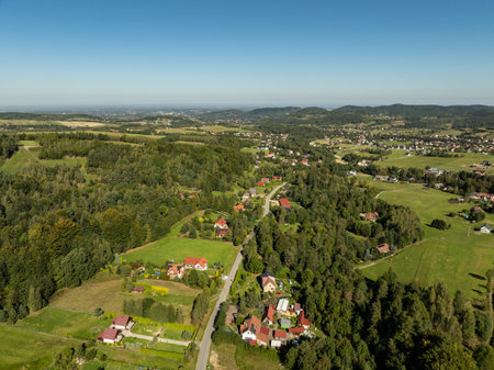Little Beskids mountain range.Aerial drone view of Rzyki Village in Beskid Maly Poland.Beskid Maly aerial panorama of potrojna hill and czarny gron.Czarny gron in Rzyki, Andrychow, Poland.の写真素材